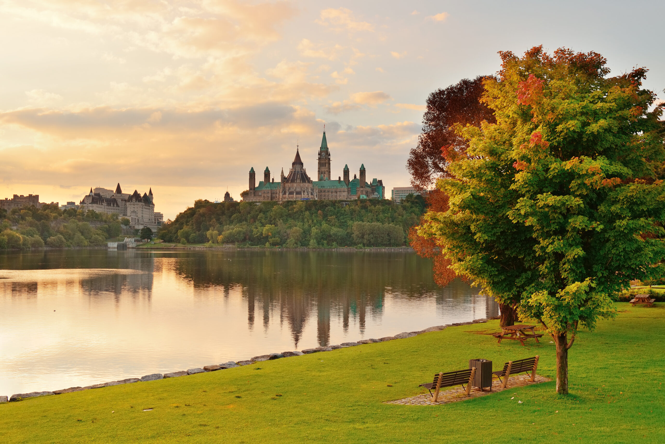 Ottawa city skyline at sunrise in the morning park view over river